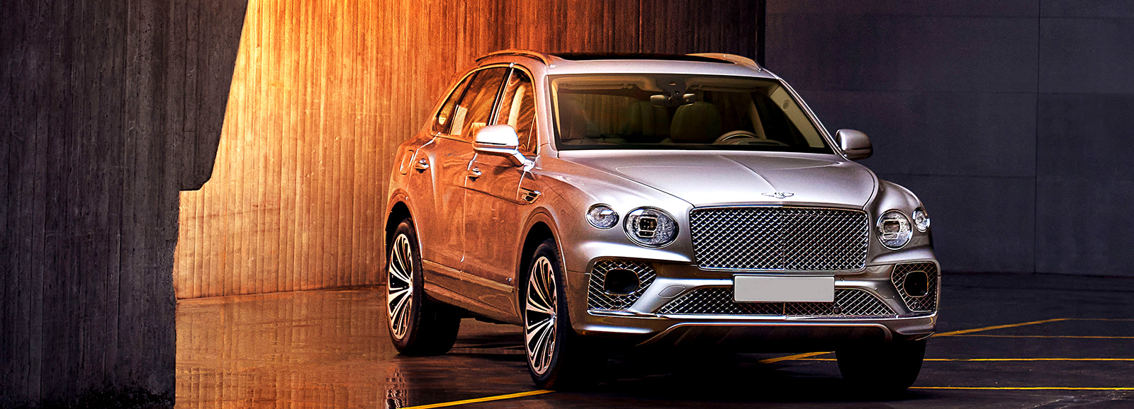 A Luxury Bentley Bentayga SUV parked in a garage